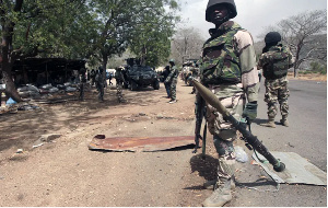 Nigerian soldiers man a checkpoint in Gwoza, Nigeria